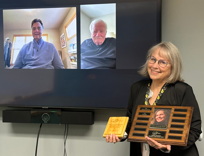 Kim Marheine recieving award